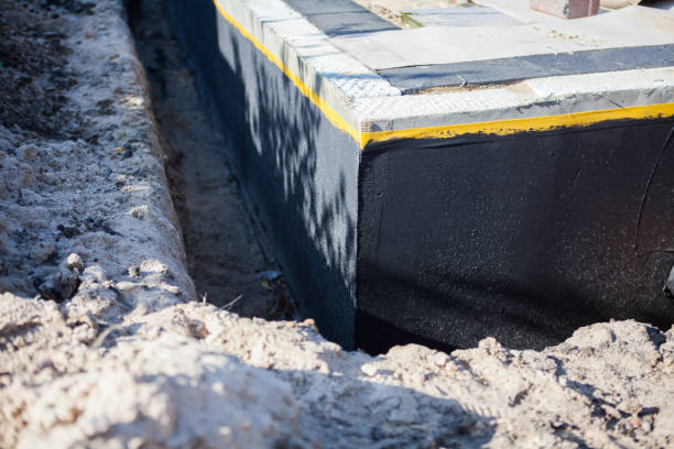 Professional Exterior Waterproofing technician working in Mulvane, KS